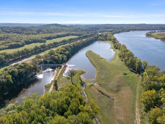a view of outdoor space with trees all around