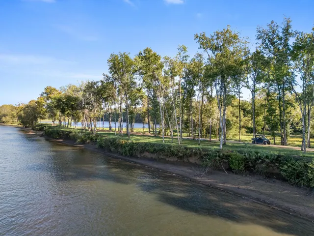 a view of a lake with mountains in the background