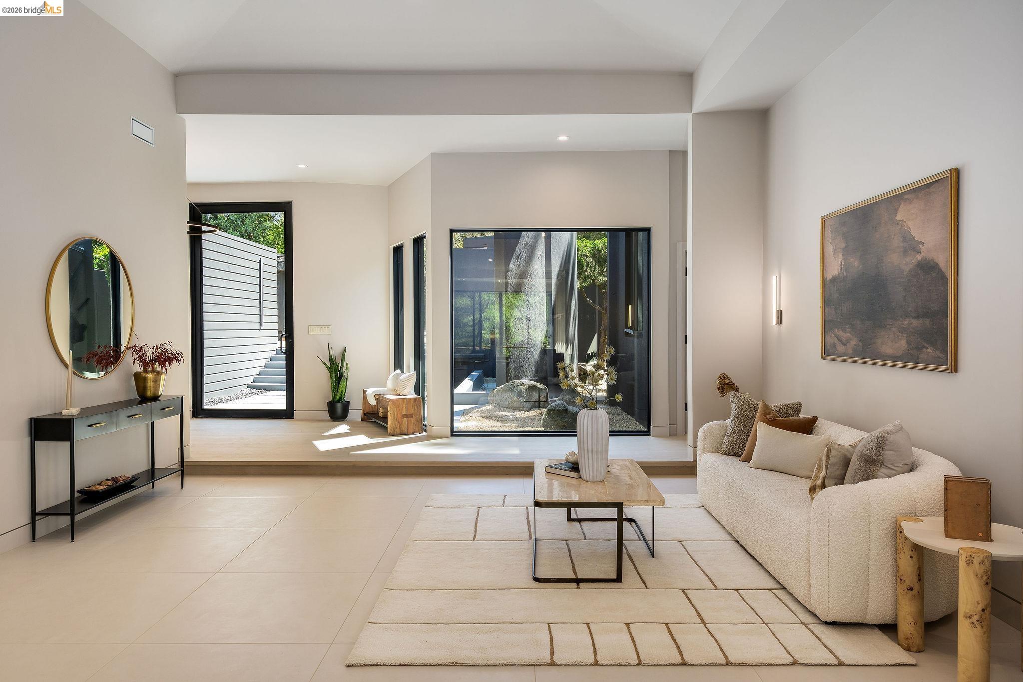 5645 Bacon Road Oakland, CA 94619 - Photo 11 of 94 Spacious interior with high ceilings and light-toned tile flooring