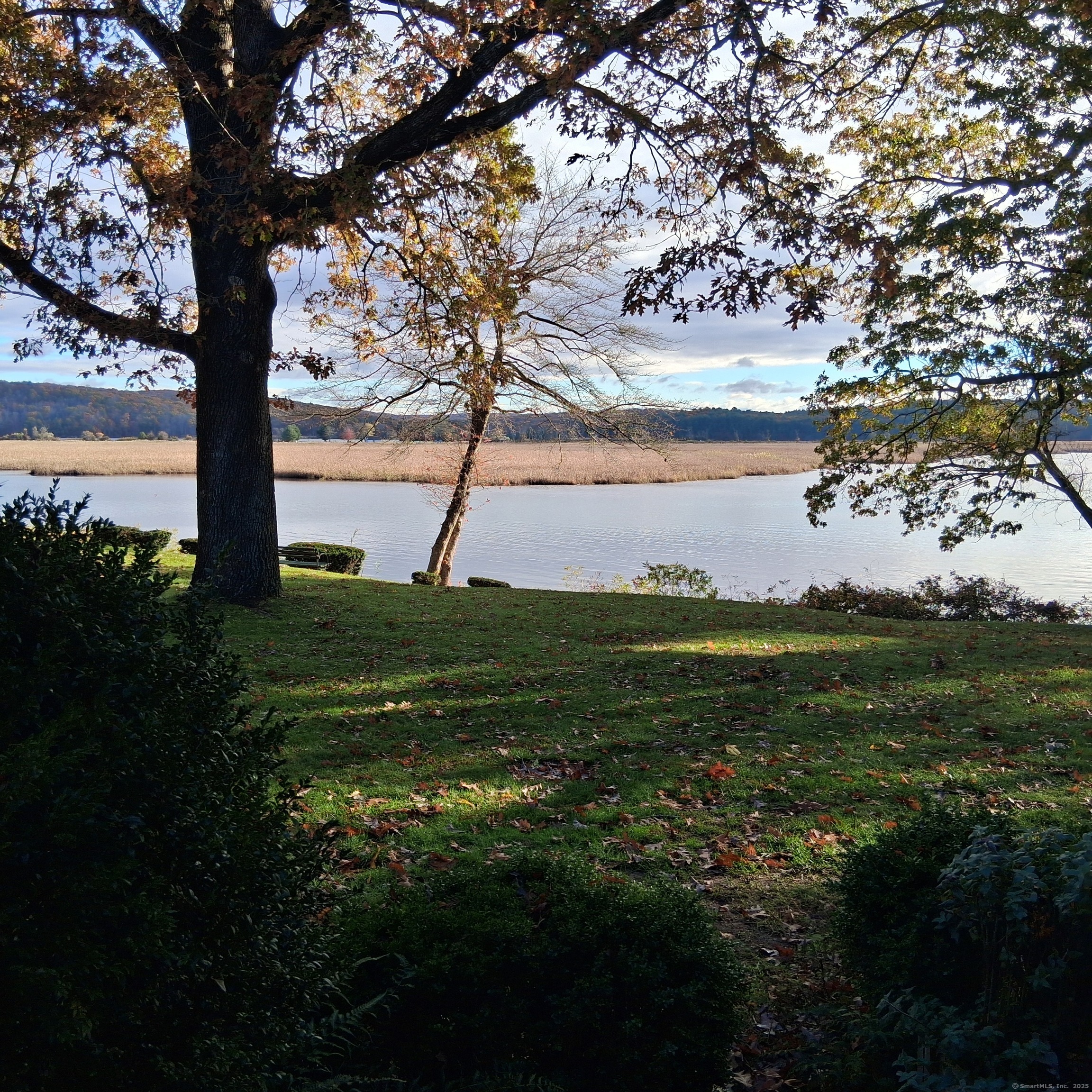 85 River Road, Unit B7 Essex, CT 06426 - Photo 3 of 23 a view of a lake with a big yard