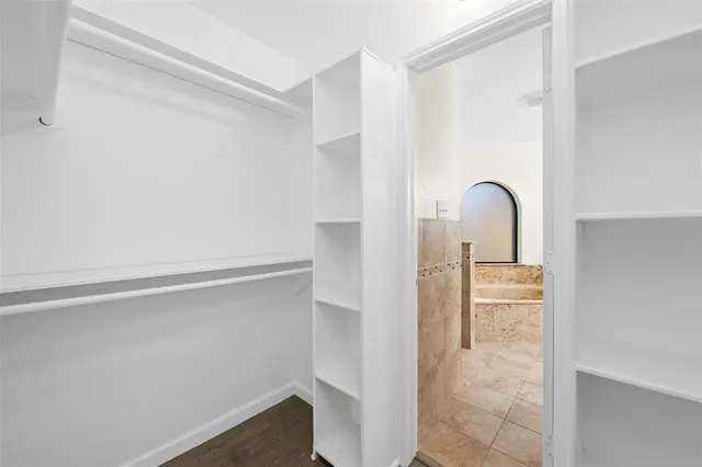 an empty room with fan