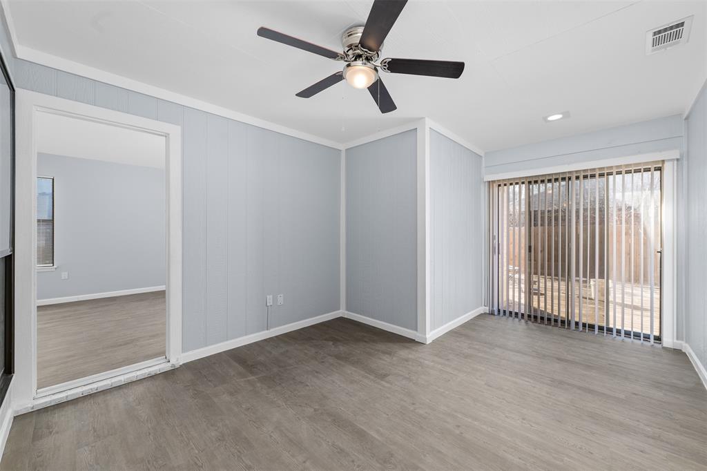 720 Sandy Trail Fort Worth, TX 76120 - Photo 18 of 26 an empty room with fan