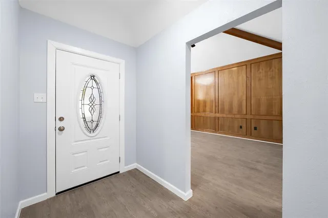 an empty room with mirror