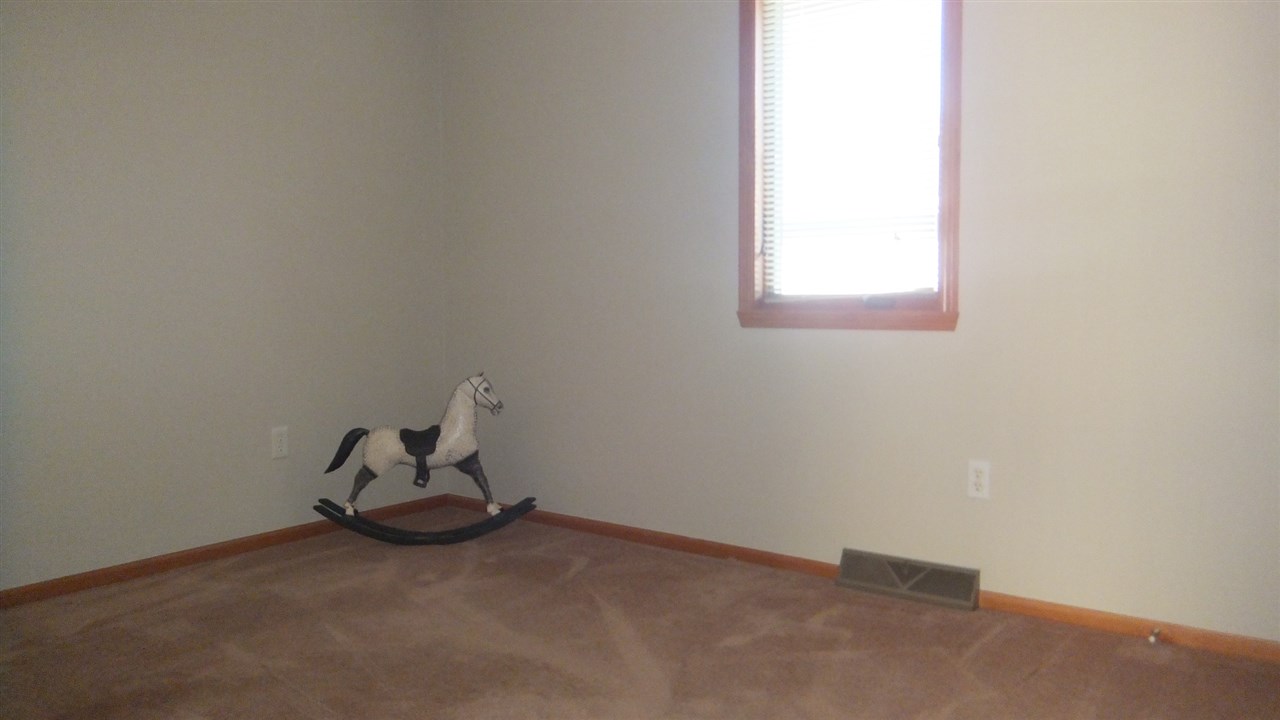 120 Minarette Drive Southwest Poplar Grove, IL 61065 - Photo 14 of 22 a room with a window