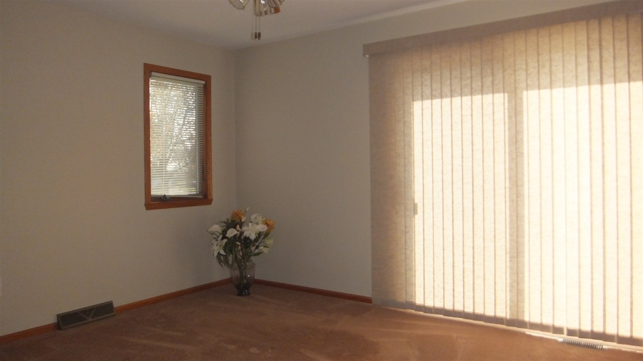 120 Minarette Drive Southwest Poplar Grove, IL 61065 - Photo 16 of 22 a view of an empty room with a window