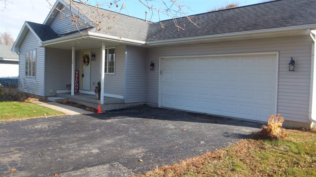 120 Minarette Drive Southwest Poplar Grove, IL 61065 - Photo 2 of 22 a view of a small house with backyard