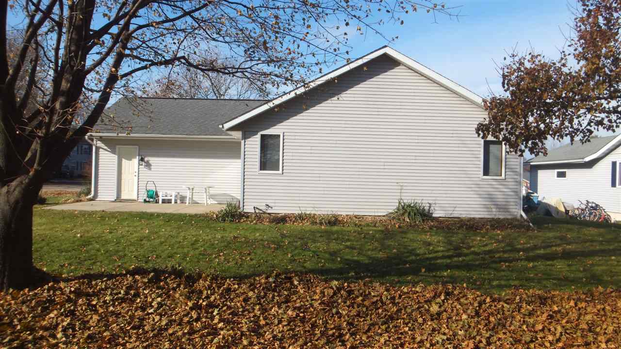 120 Minarette Drive Southwest Poplar Grove, IL 61065 - Photo 3 of 22 a front view of a house with a yard