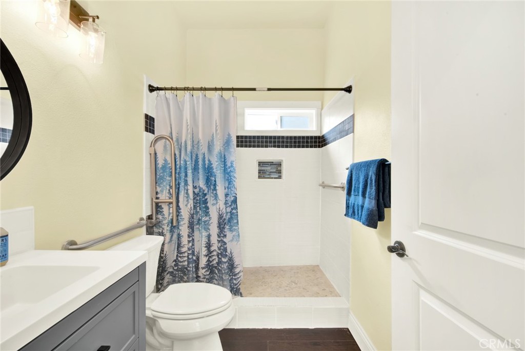 20506 Corning Road Corning, CA 96021 - Photo 26 of 53 a bathroom with a sink a toilet and shower