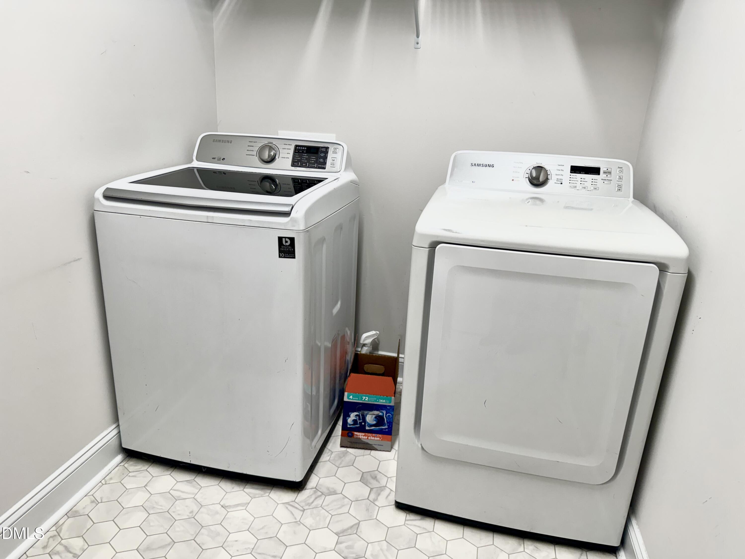 228 Ridgemoore Court Four Oaks, NC 27524 - Photo 18 of 30 a utility room with dryer and washer
