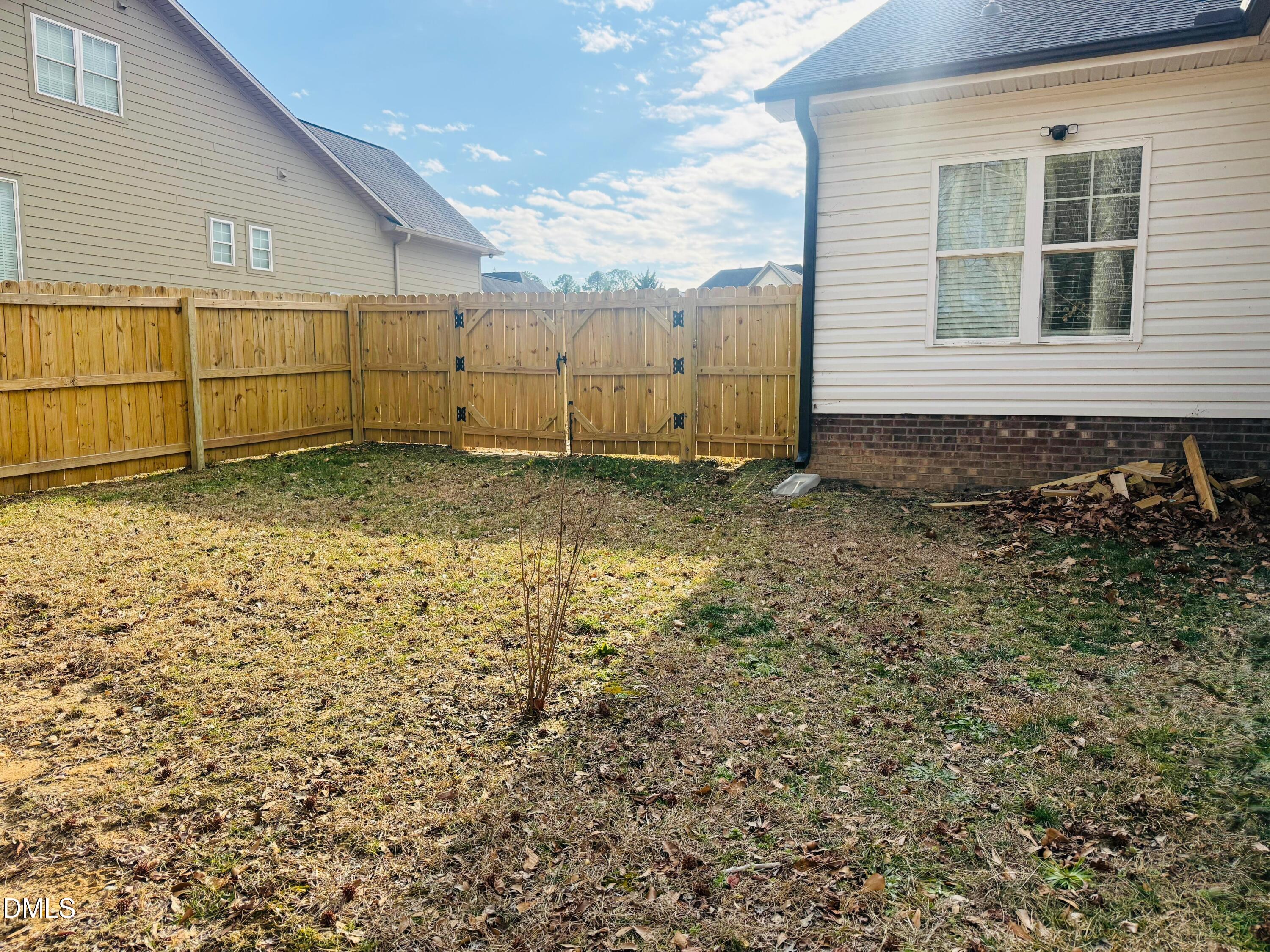 228 Ridgemoore Court Four Oaks, NC 27524 - Photo 25 of 30 a view of a backyard