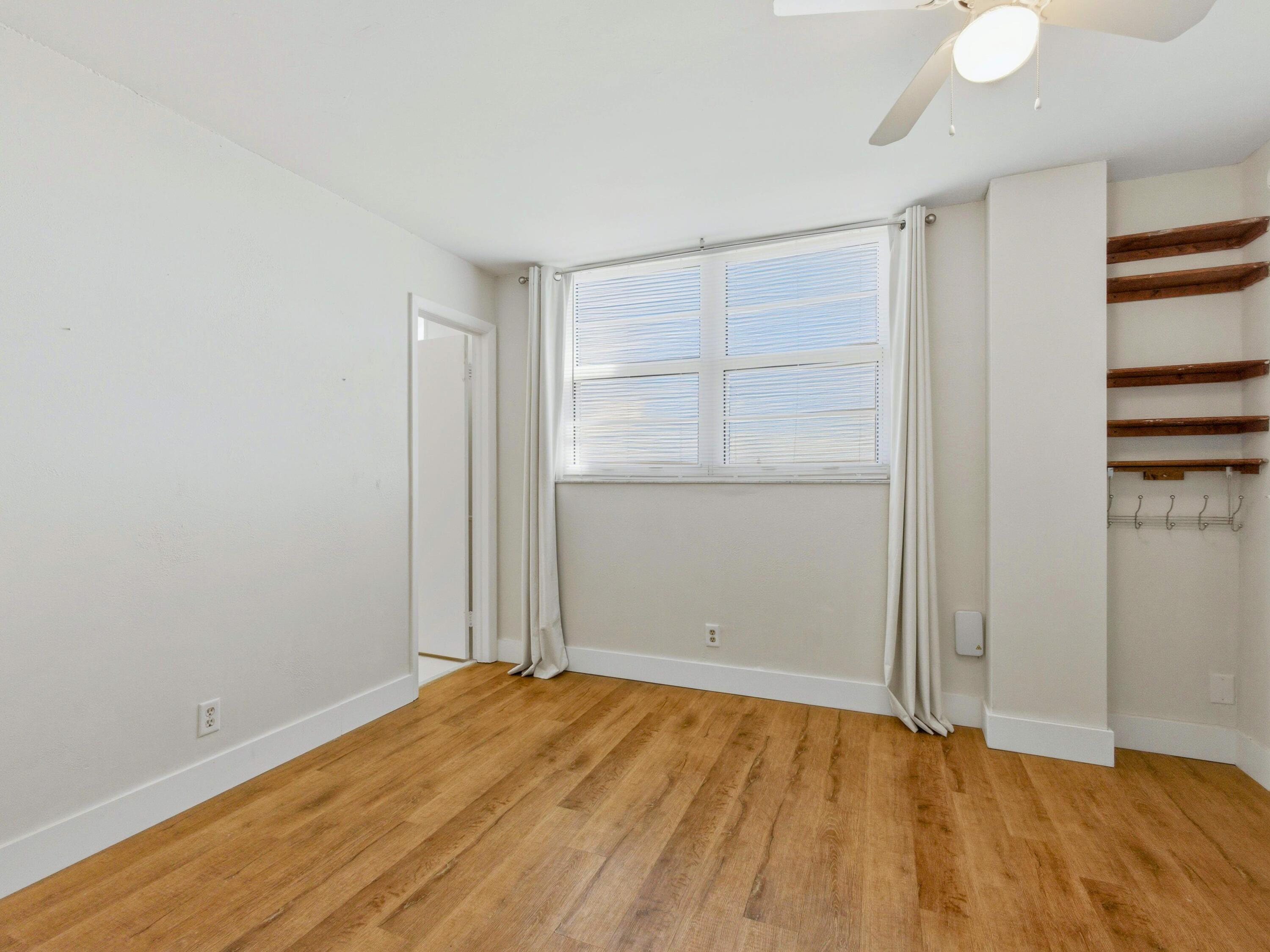 5500 Northwest 2nd Avenue, Unit 519 Boca Raton, FL 33487 - Photo 25 of 48 an empty room with a natural light