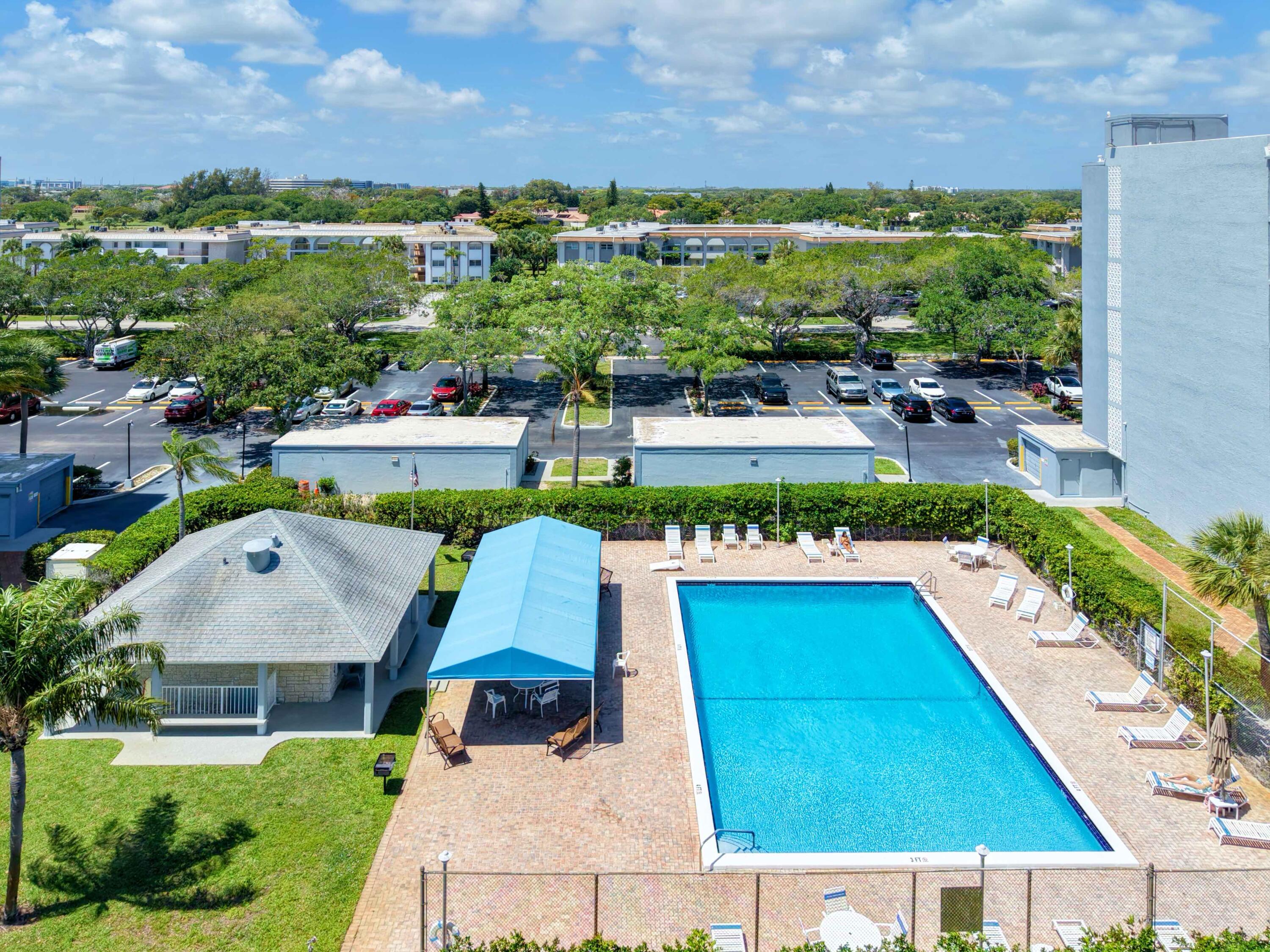 5500 Northwest 2nd Avenue, Unit 519 Boca Raton, FL 33487 - Photo 41 of 48 a view of swimming pool and outdoor seating