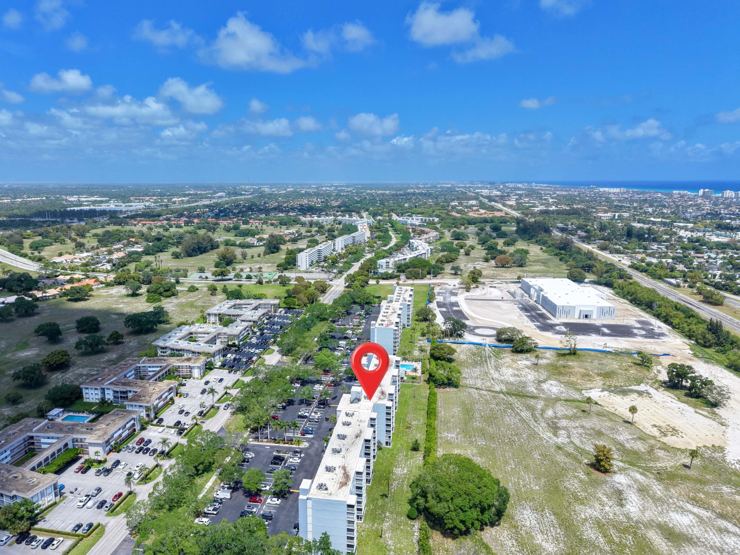 5500 Northwest 2nd Avenue, Unit 519 Boca Raton, FL 33487 - Photo 46 of 48 an aerial view of residential houses with outdoor space