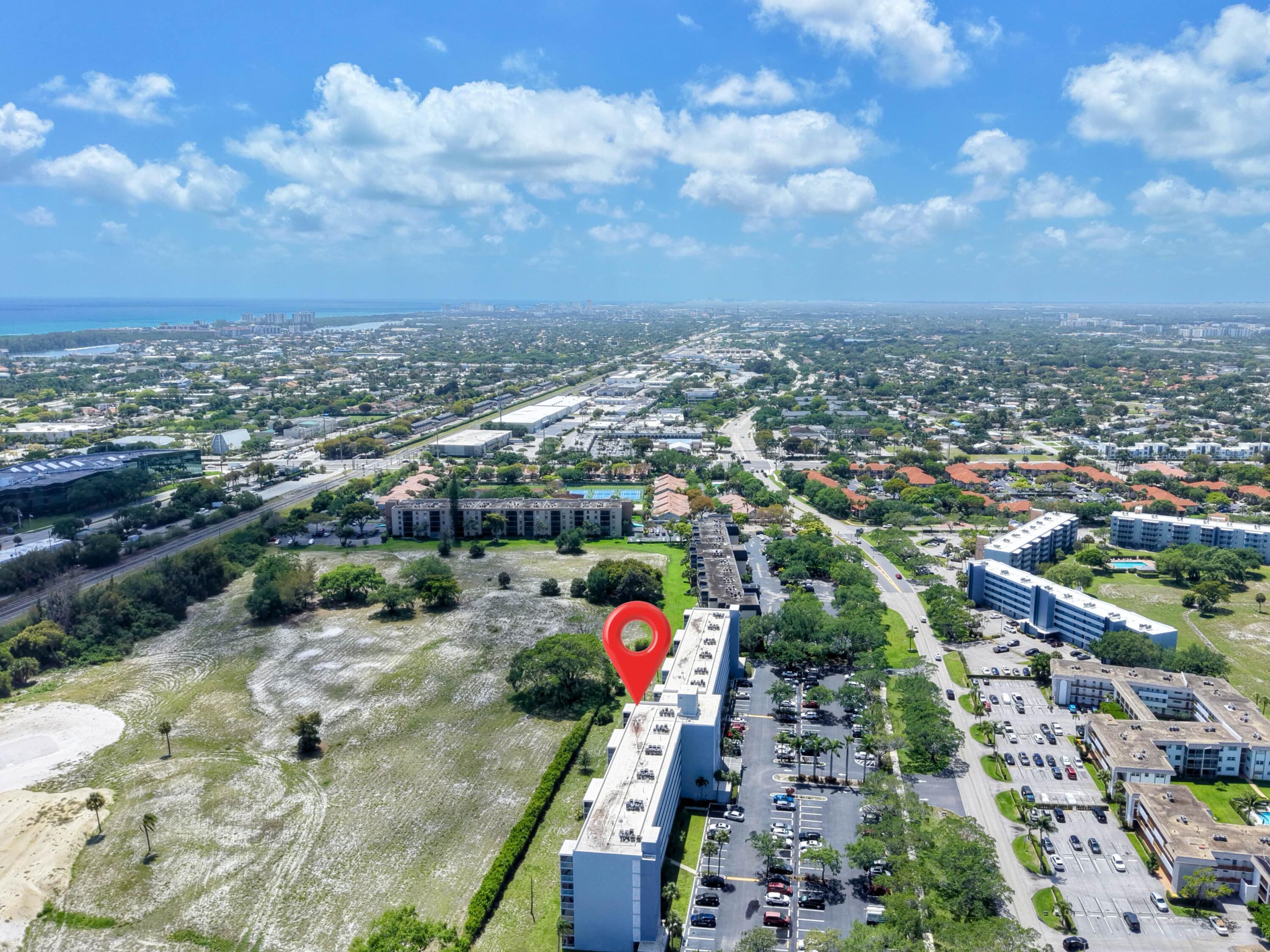 5500 Northwest 2nd Avenue, Unit 519 Boca Raton, FL 33487 - Photo 47 of 48 an aerial view of house with yard
