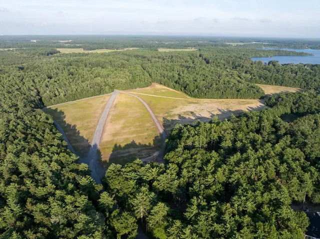 a view of a lake and a yard