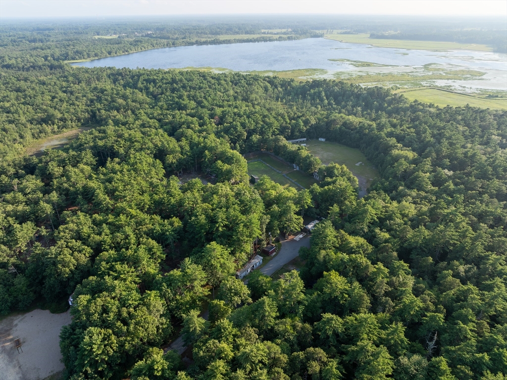 235 South Main Street Carver, MA 02330 - Photo 20 of 34 an aerial view of residential houses with outdoor space and ocean view