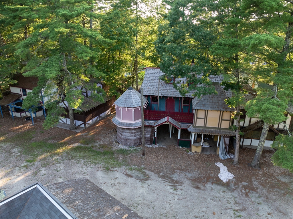 235 South Main Street Carver, MA 02330 - Photo 9 of 34 a backyard of a house with table and chairs