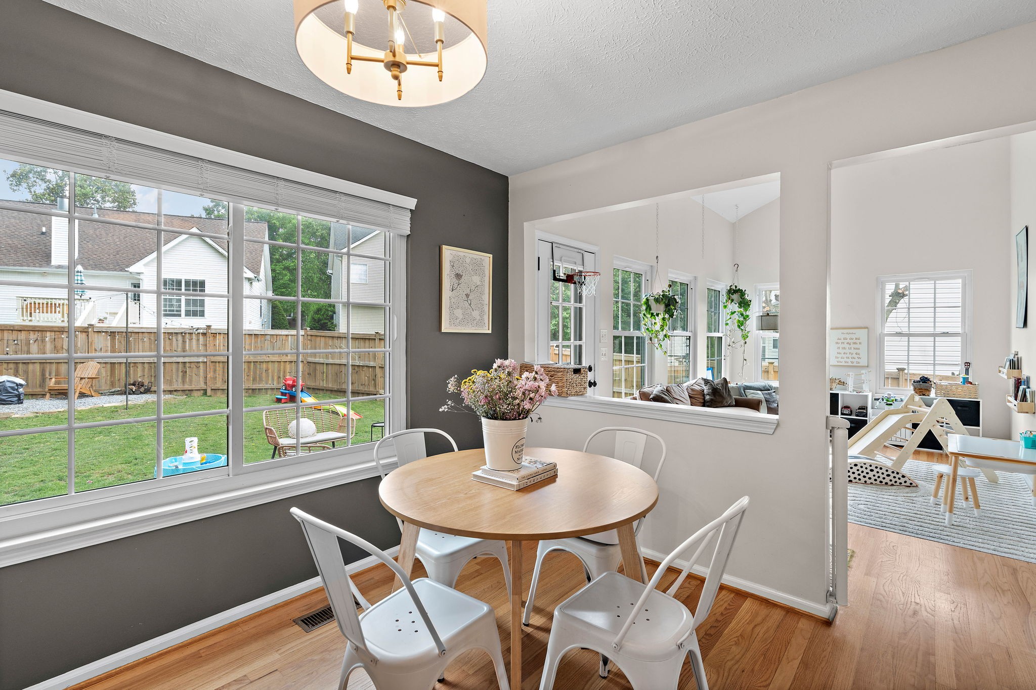 2104 Melody Drive Franklin, TN 37067 - Photo 16 of 30 a view of a dining room with furniture a chandelier and wooden floor