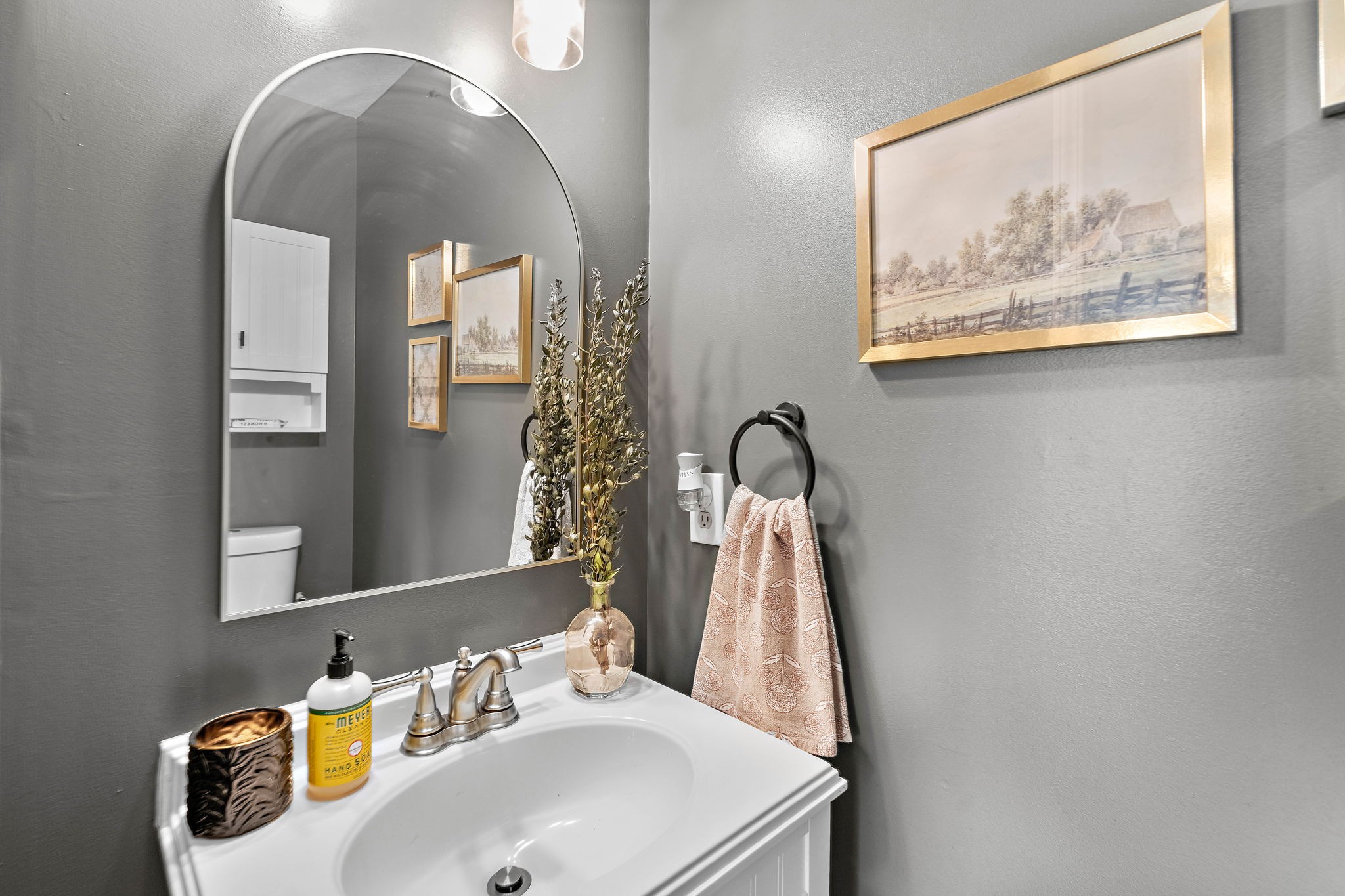 2104 Melody Drive Franklin, TN 37067 - Photo 17 of 30 a bathroom with a sink and a mirror