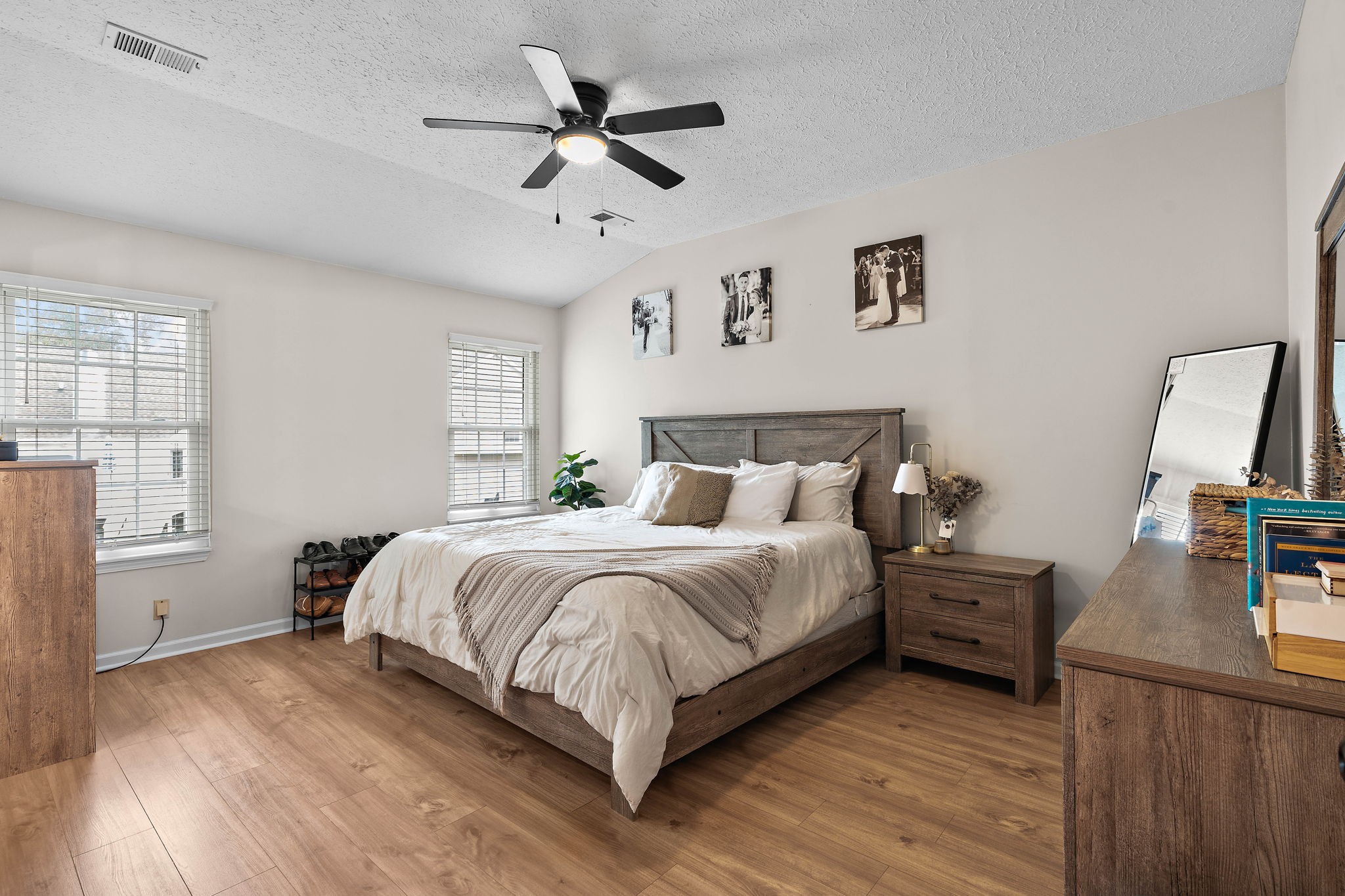 2104 Melody Drive Franklin, TN 37067 - Photo 18 of 30 a spacious bedroom with a bed and a flat screen tv