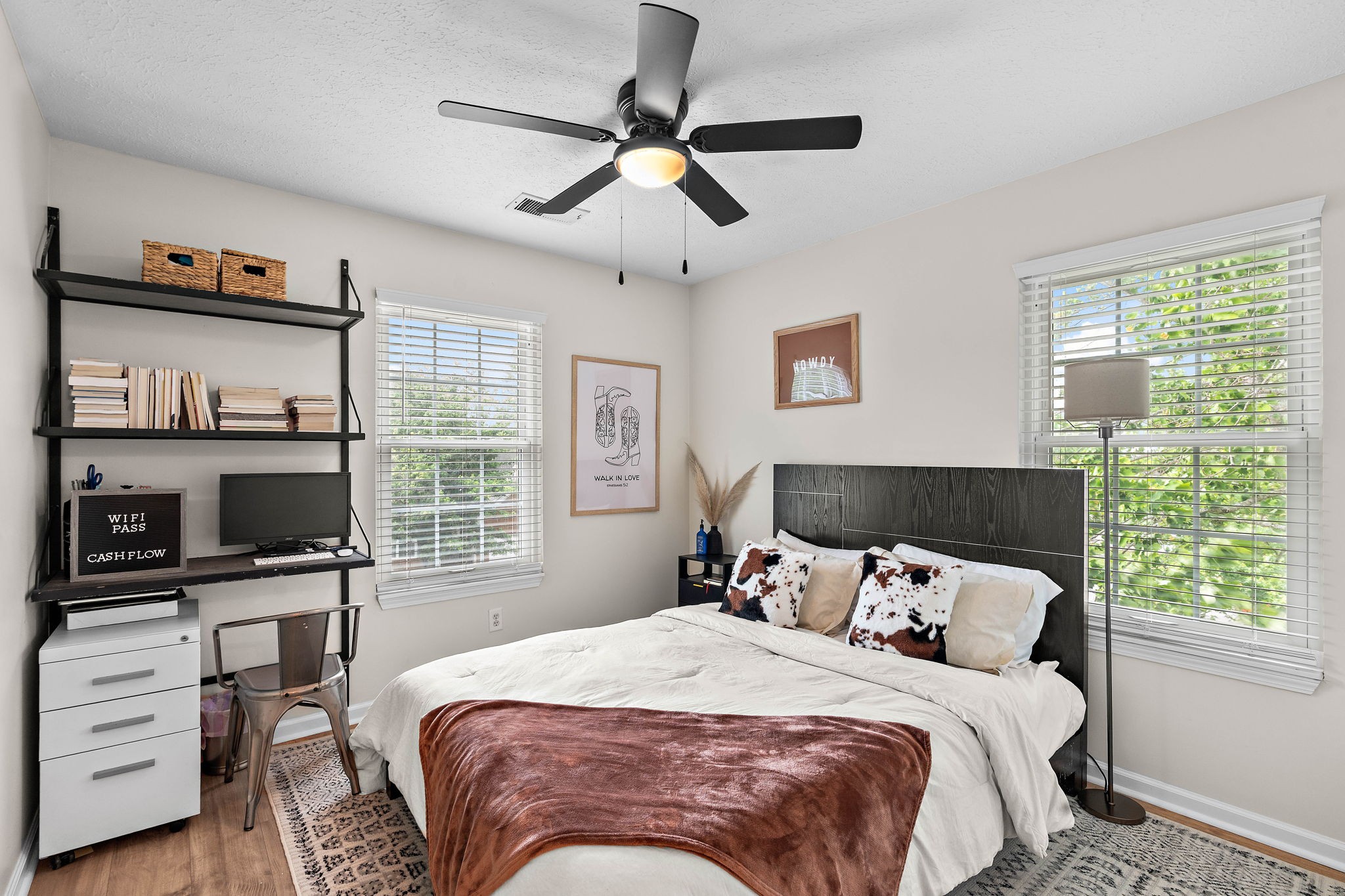 2104 Melody Drive Franklin, TN 37067 - Photo 24 of 30 a bedroom with a bed window and a table