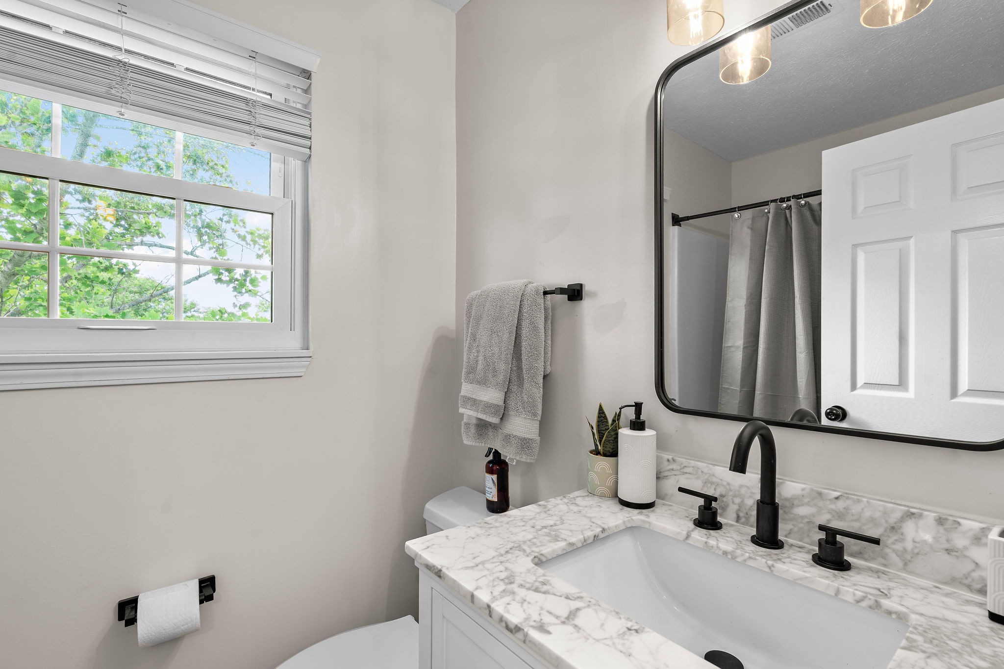 2104 Melody Drive Franklin, TN 37067 - Photo 25 of 30 a bathroom with a granite countertop sink and a mirror