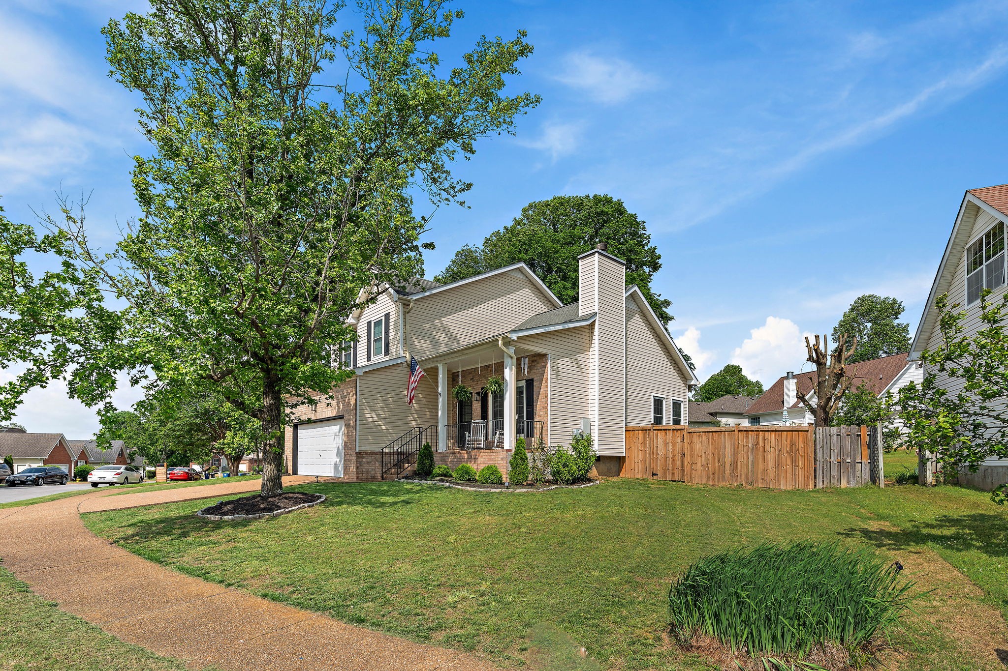 2104 Melody Drive Franklin, TN 37067 - Photo 4 of 30 a front view of a house with a yard