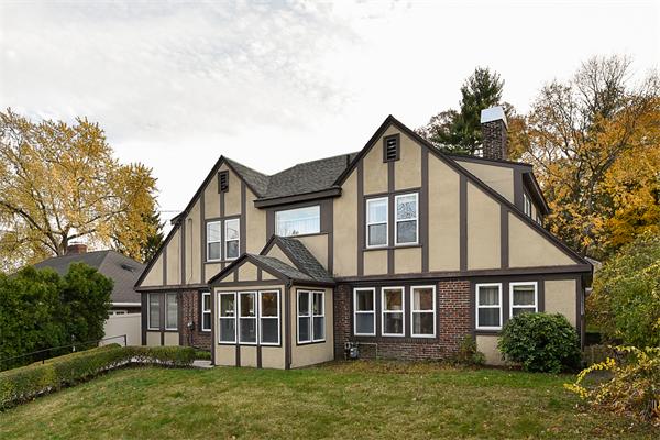 284 Pond Street Boston, MA 02130 - Photo 1 of 27 front view of a house with a yard