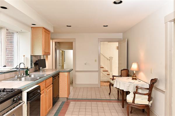 284 Pond Street Boston, MA 02130 - Photo 13 of 27 a spacious bathroom with a double vanity sink and a mirror