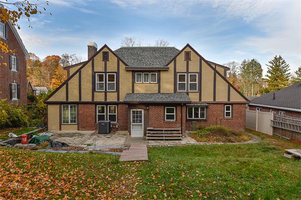 284 Pond Street Boston, MA 02130 - Photo 23 of 27 a view of a house with a yard and plants