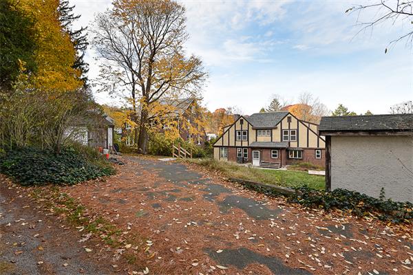 284 Pond Street Boston, MA 02130 - Photo 25 of 27 a view of a house with a yard