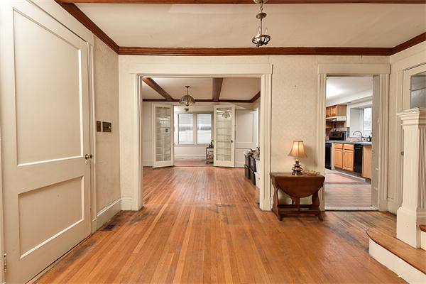 284 Pond Street Boston, MA 02130 - Photo 7 of 27 a living room with furniture and a wooden floor