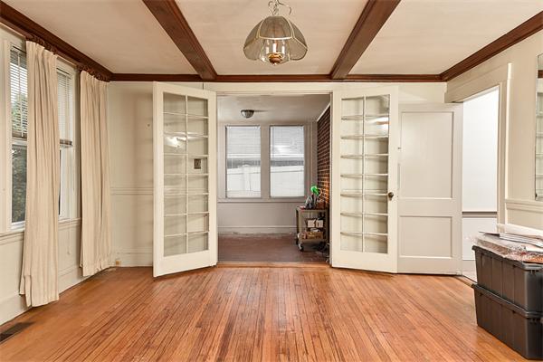 284 Pond Street Boston, MA 02130 - Photo 8 of 27 a view of empty room with wooden floor and fan