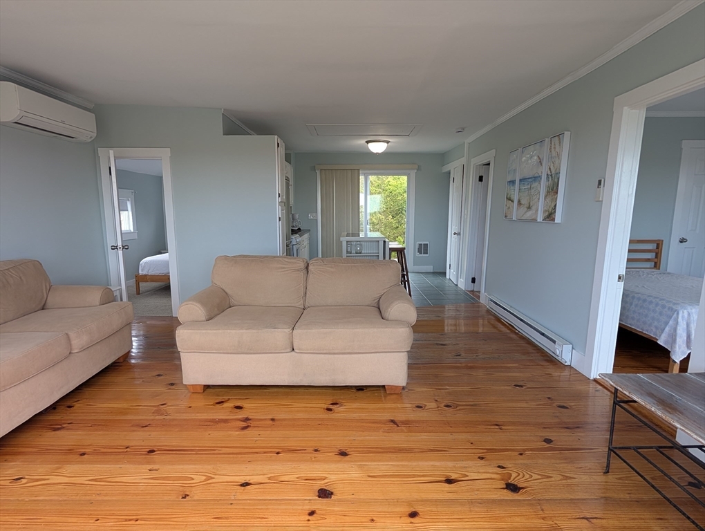 44 Old Point Road Newbury, MA 01951 - Photo 4 of 7 a living room with furniture and a wooden floor