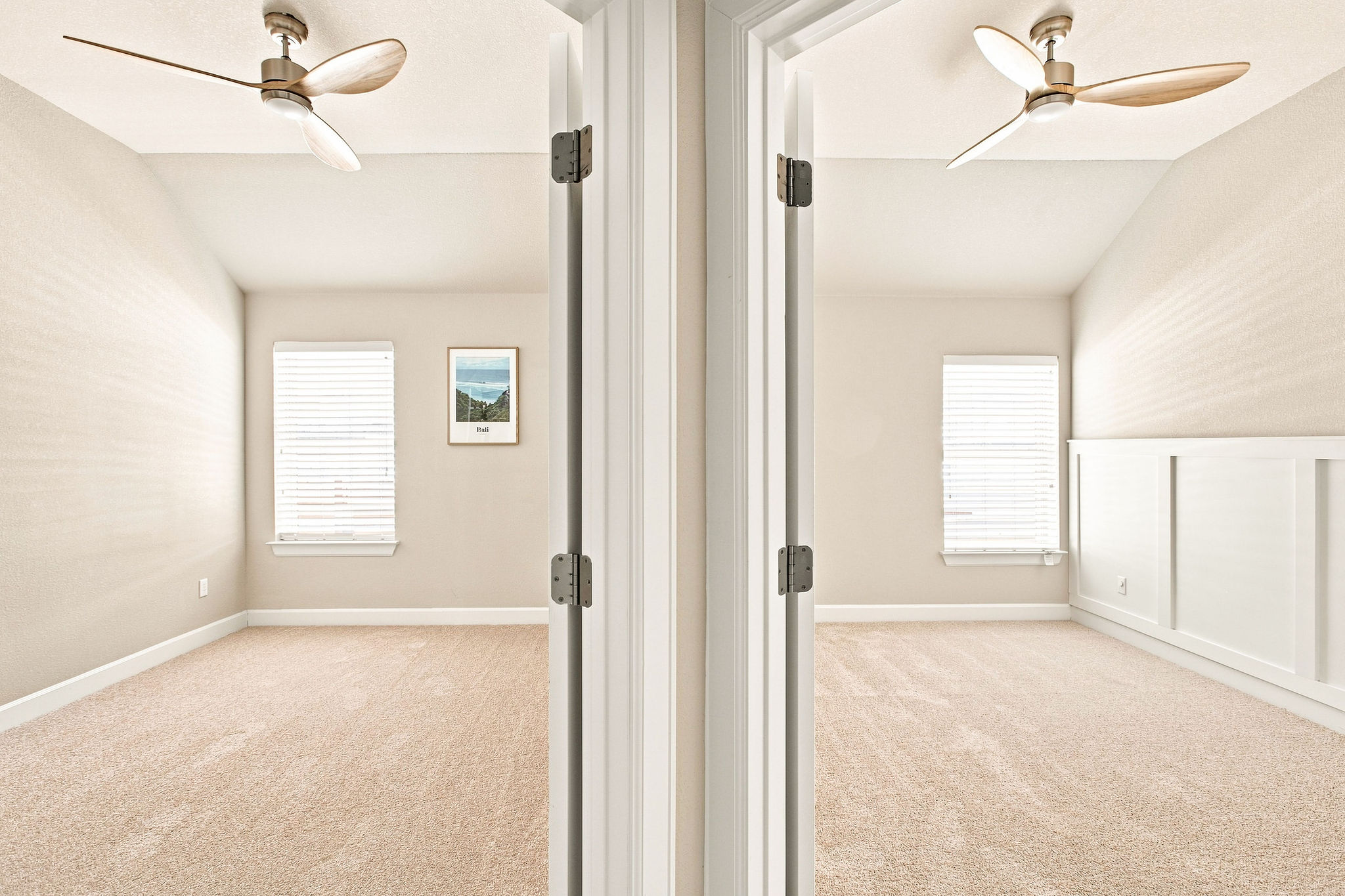 6100 Gunnison Turn Road Austin, TX 78738 - Photo 27 of 34 Plush carpeting underfoot and clean wainscoting details define these bright secondary bedrooms.