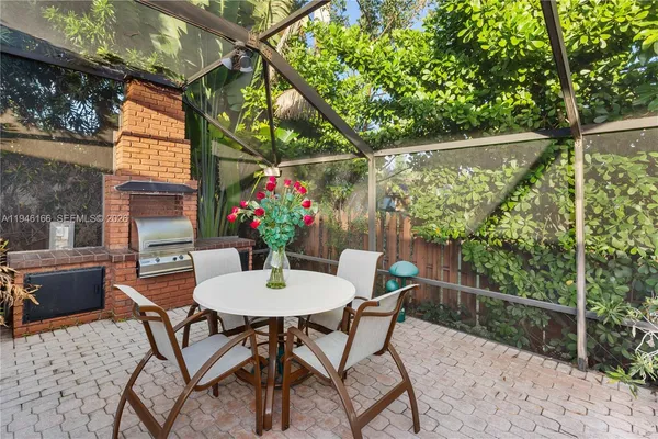 a outdoor space with lots of potted plants