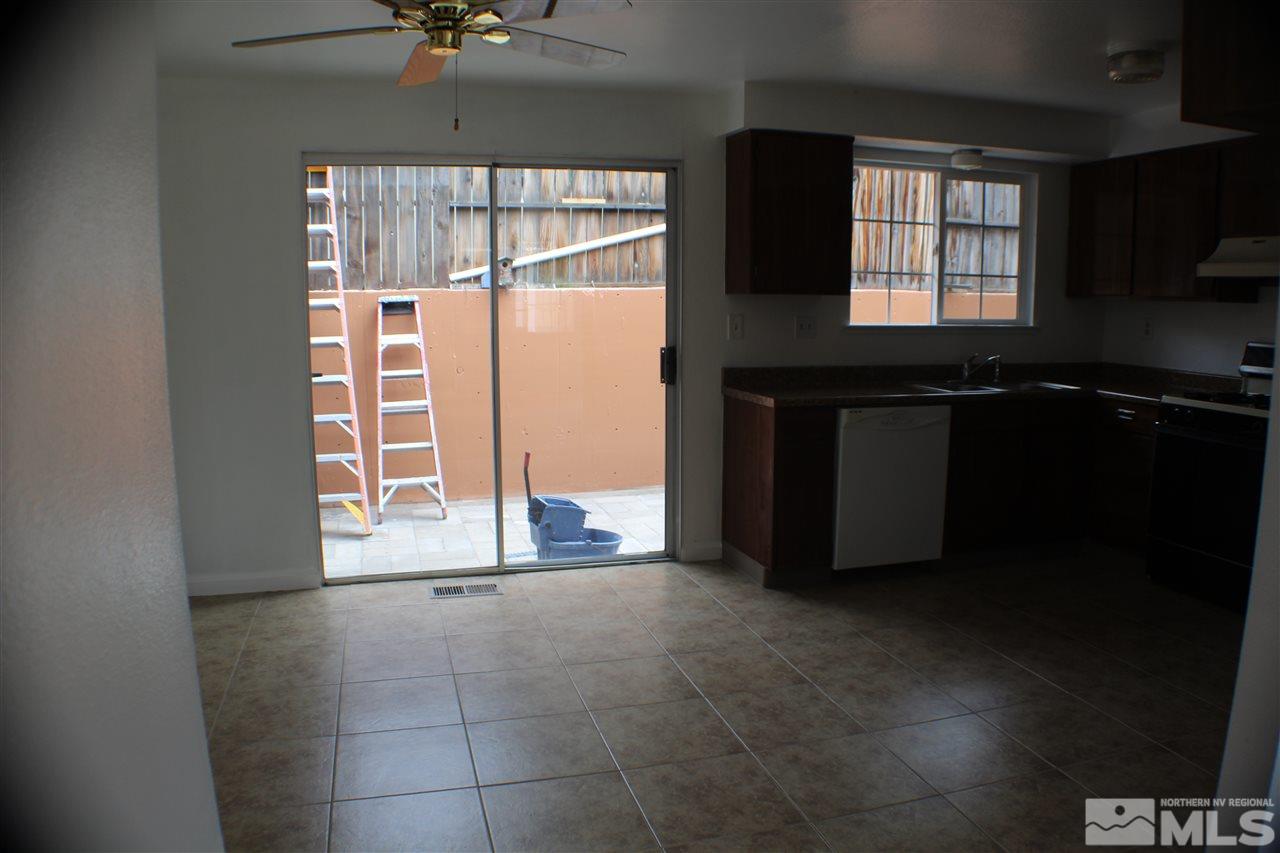 6750 Flower Street Reno, NV 89506 - Photo 4 of 15 a view of an empty room with a window