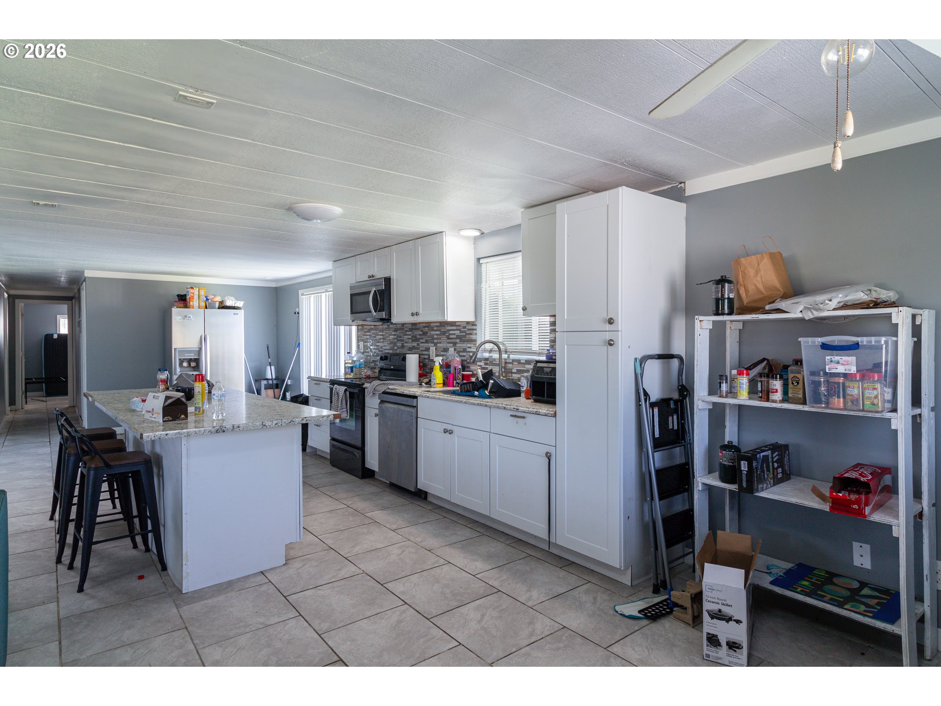 80649 Crooked Road Irrigon, OR 97844 - Photo 8 of 21 a kitchen with refrigerator and cabinets