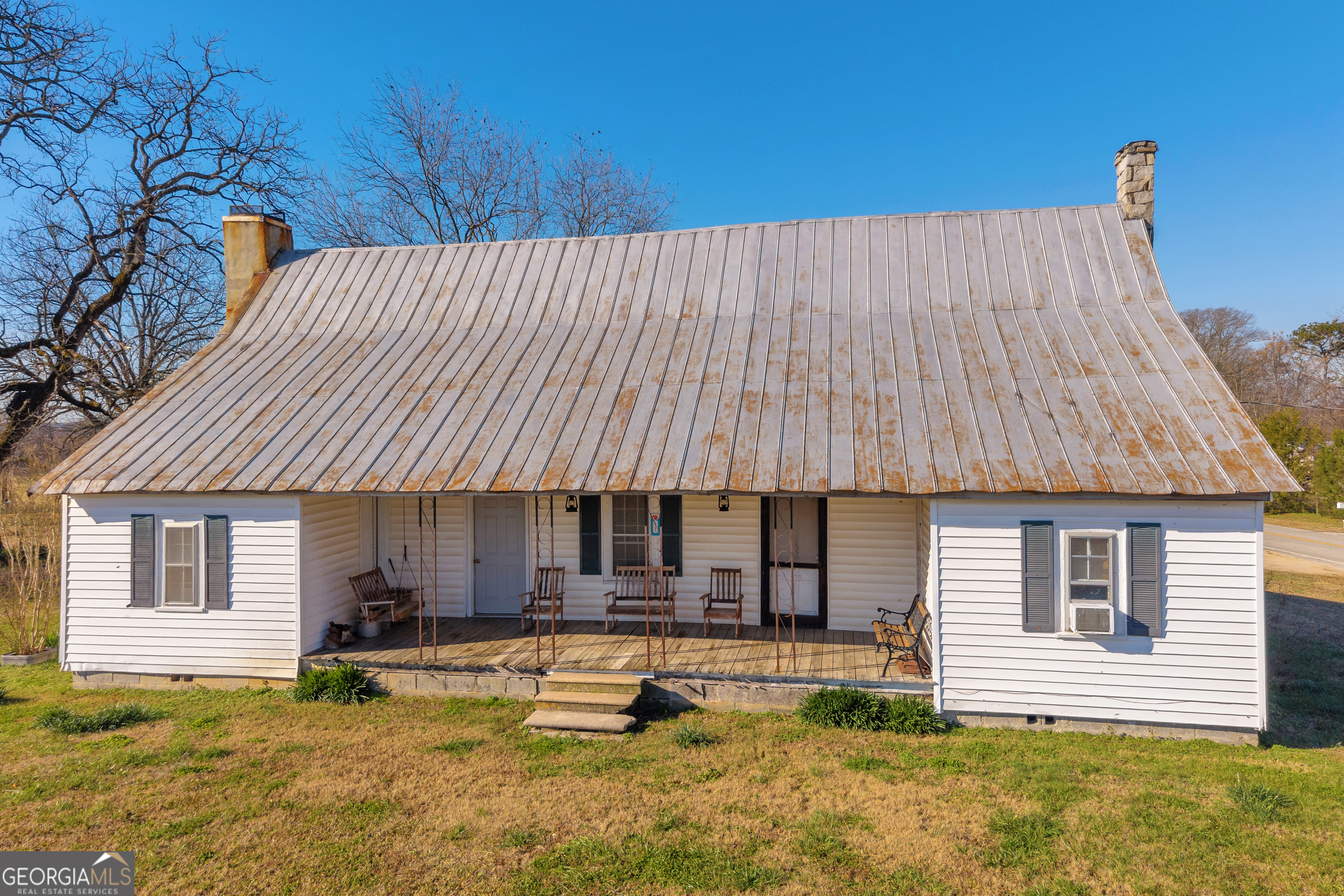 1191 Plain View Road Carnesville, GA 30521 - Photo 19 of 62 a view of a house with swimming pool and sitting area