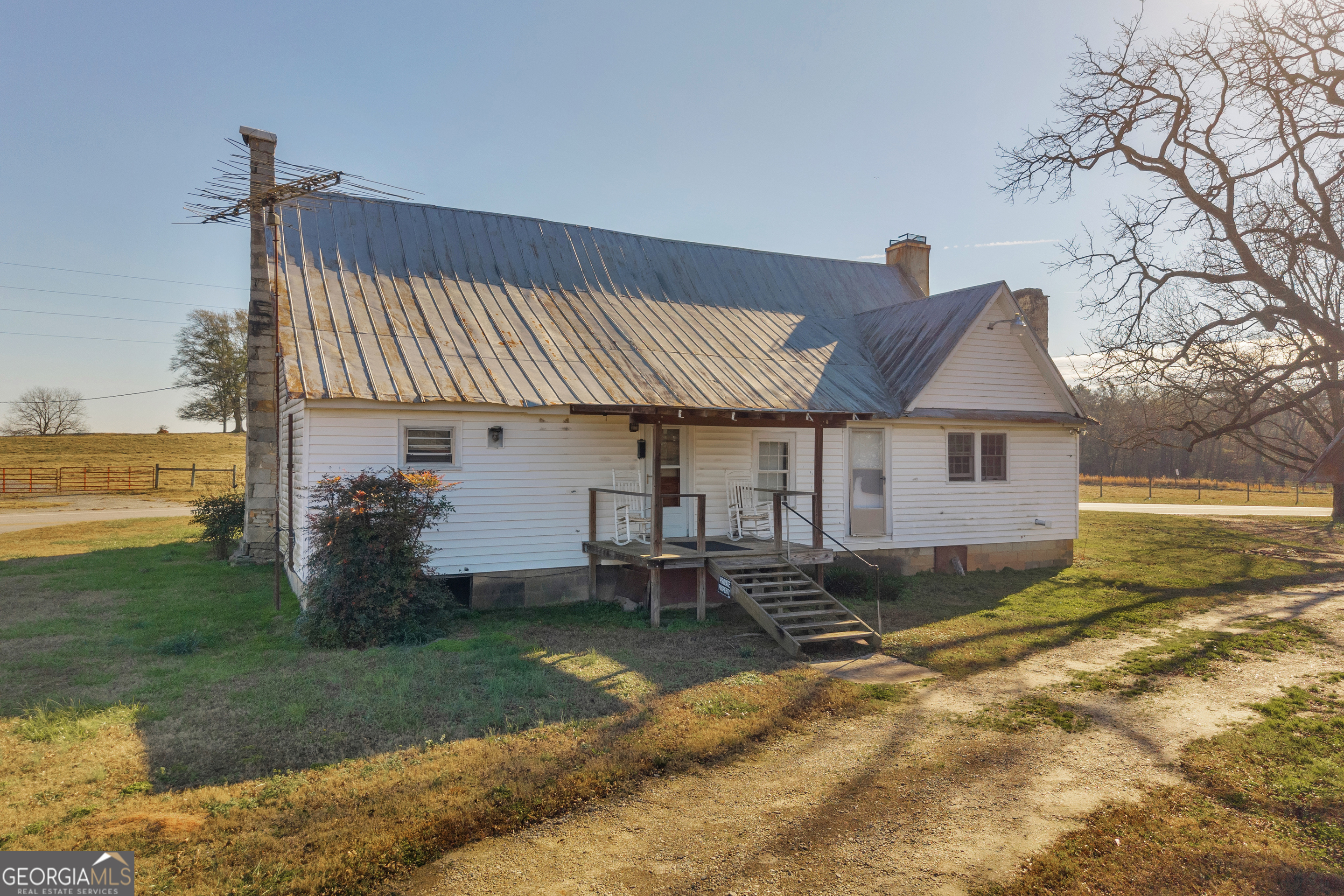 1191 Plain View Road Carnesville, GA 30521 - Photo 25 of 62 a front view of a house with garden