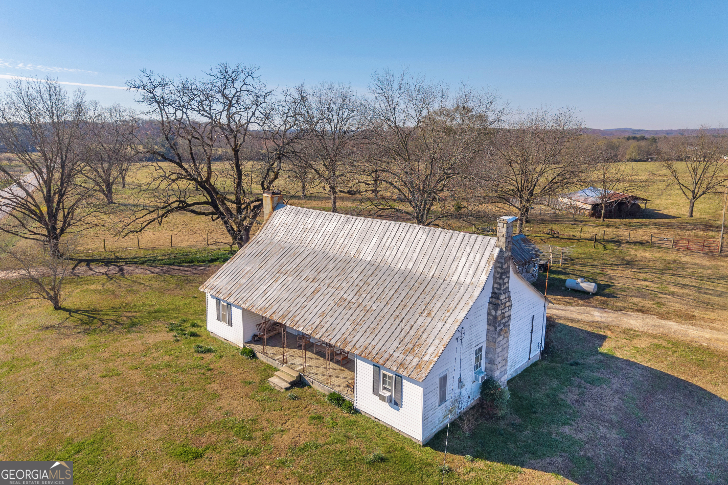 1191 Plain View Road Carnesville, GA 30521 - Photo 26 of 62 a view of a backyard with plants and lake view