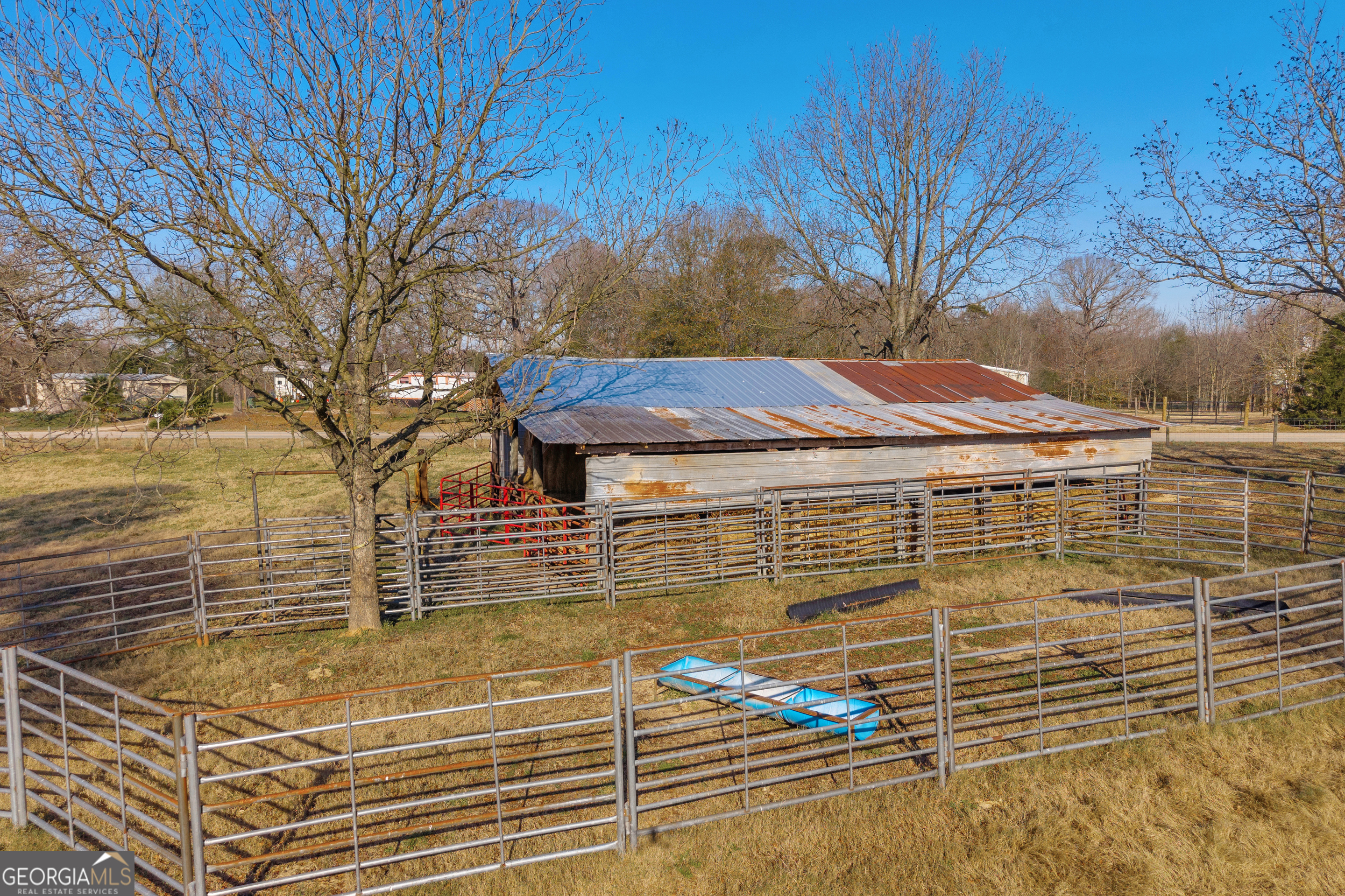 1191 Plain View Road Carnesville, GA 30521 - Photo 35 of 62 a view of a swimming pool with an outdoor space and seating area