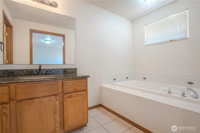 a bathroom with a sink and a bathtub