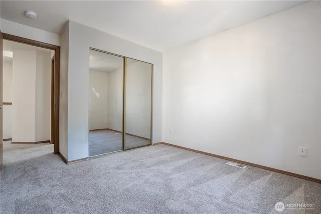 an empty room with sliding door