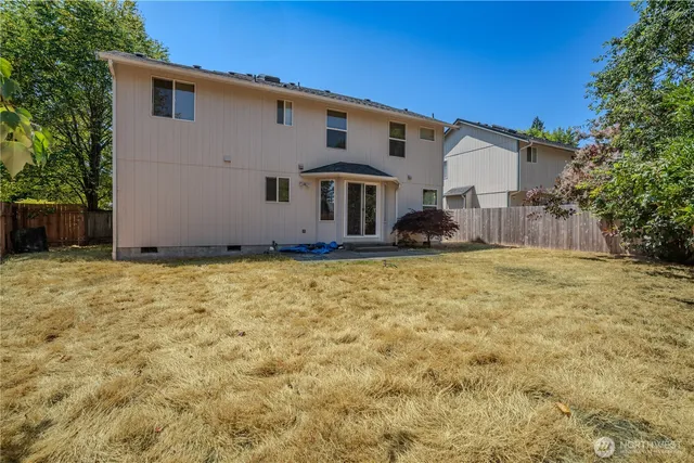 a front view of house with yard