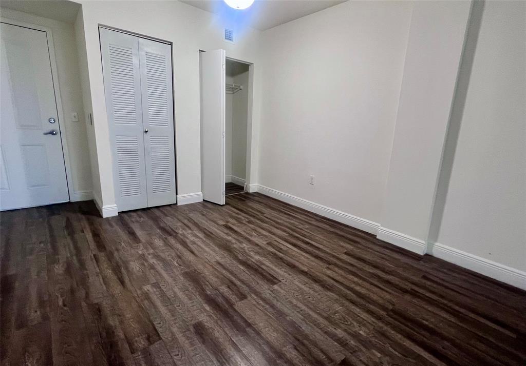 18335 Northwest 68th Avenue, Unit 255308 Hialeah, FL 33015 - Photo 3 of 17 a view of hallway with wooden floor