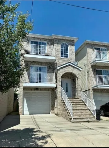 a view of front of house with deck