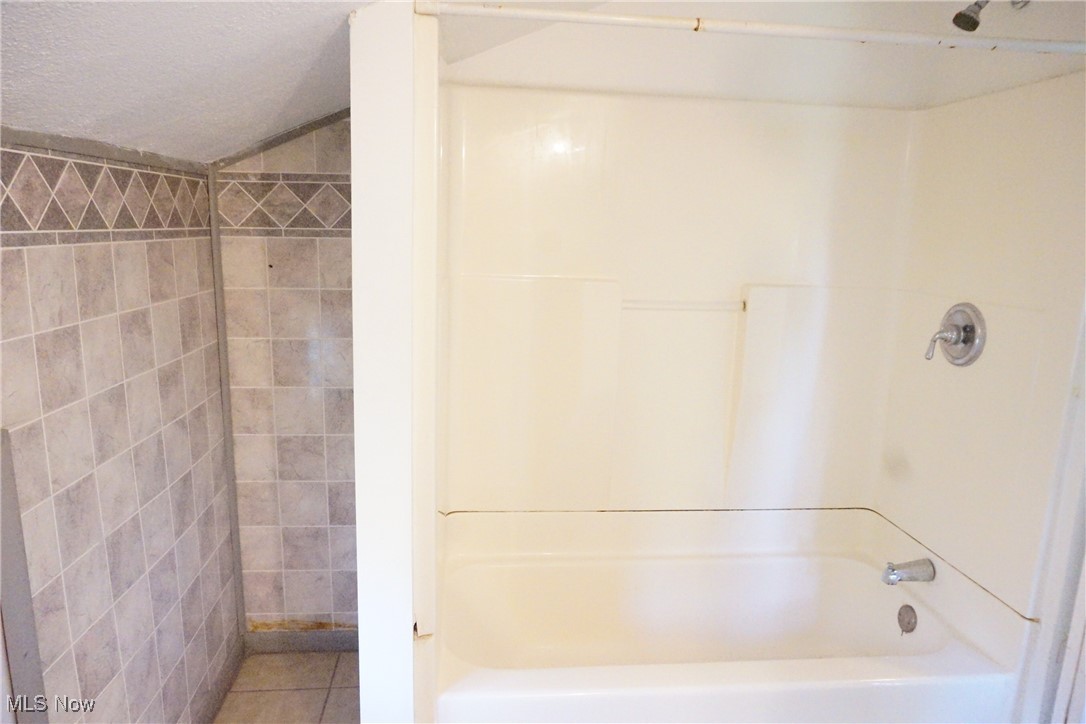 3276 Cottage Grove Road Akron, OH 44319 - Photo 14 of 18 Bathroom view 2 of 2 featuring tub/shower combo