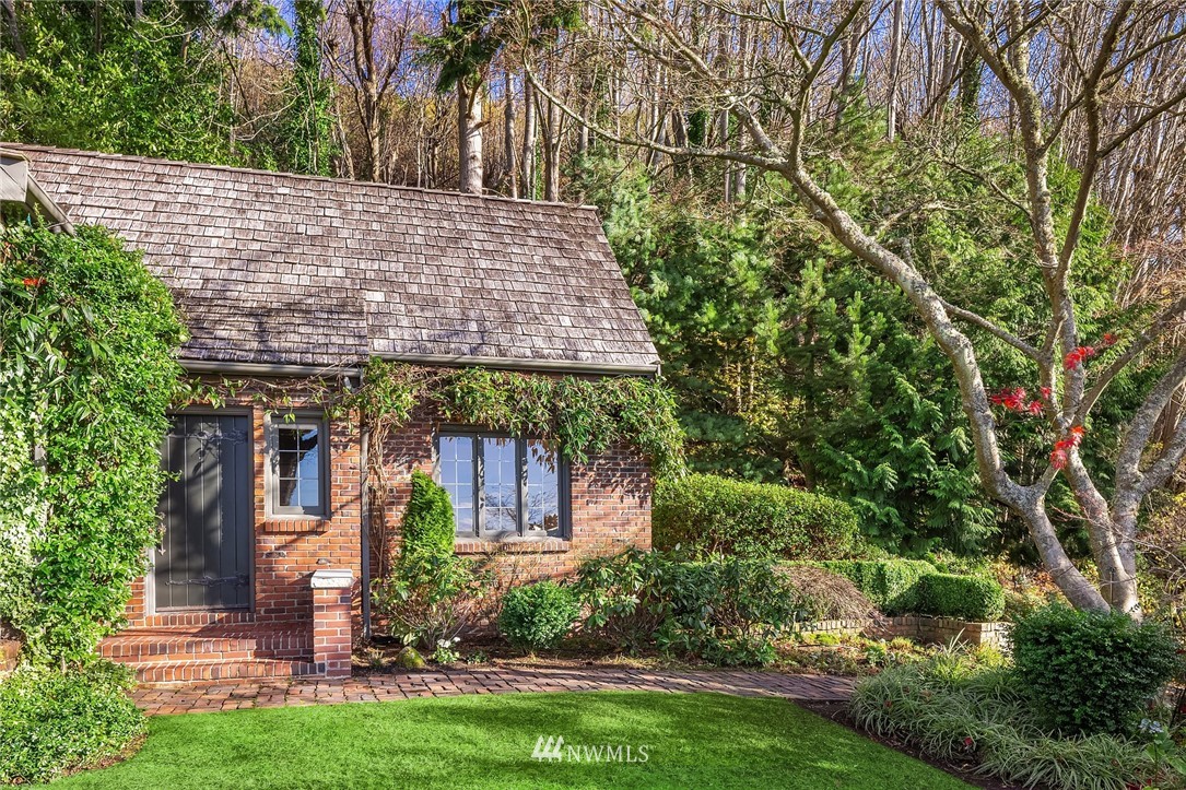 4706 West Ruffner Street Seattle, WA 98199 - Photo 2 of 27 a aerial view of a house with a yard