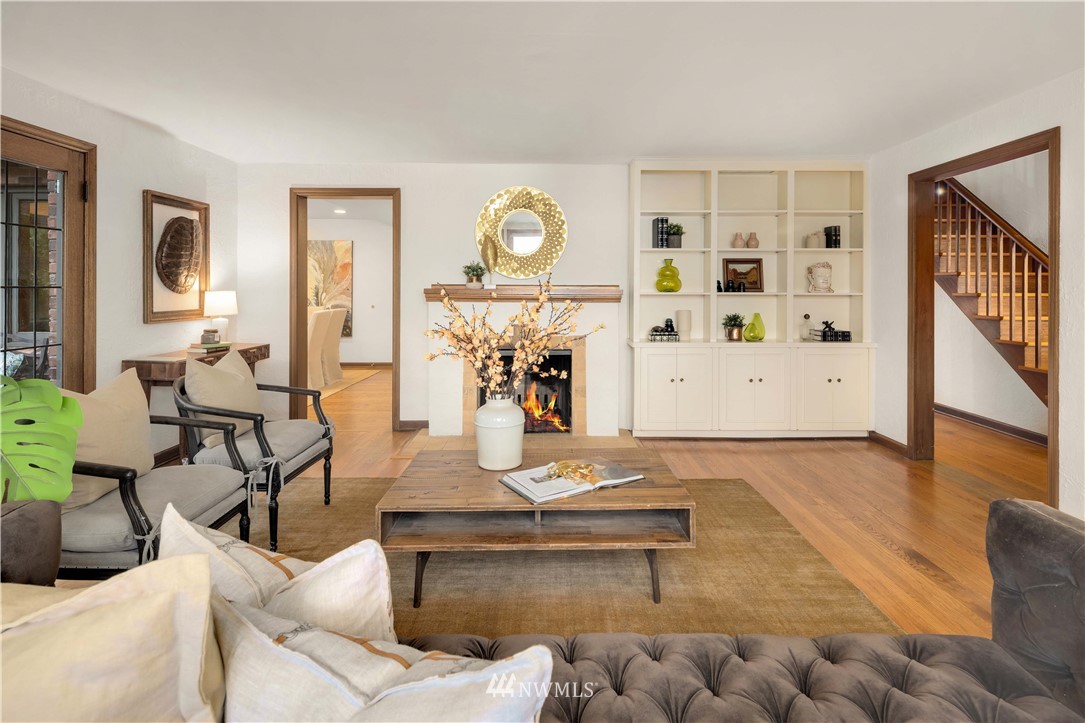 4706 West Ruffner Street Seattle, WA 98199 - Photo 11 of 27 a living room with furniture and wooden floor